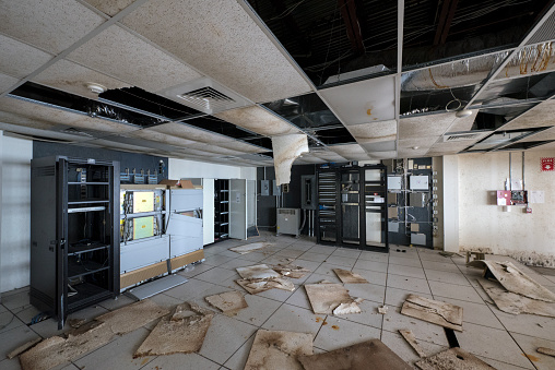 Interior view of an abandoned decaying empty office building